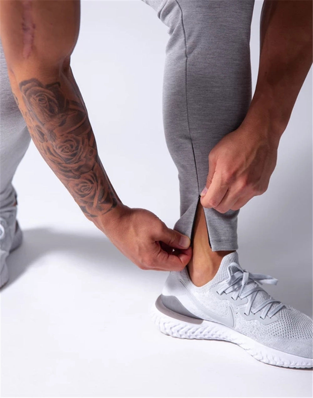 2019 Men's Sports Pants Men's Slim-Fit Elastic Invisible Zipper Casual Pants Stretch Cotton Foot-Retaining Pants Men's