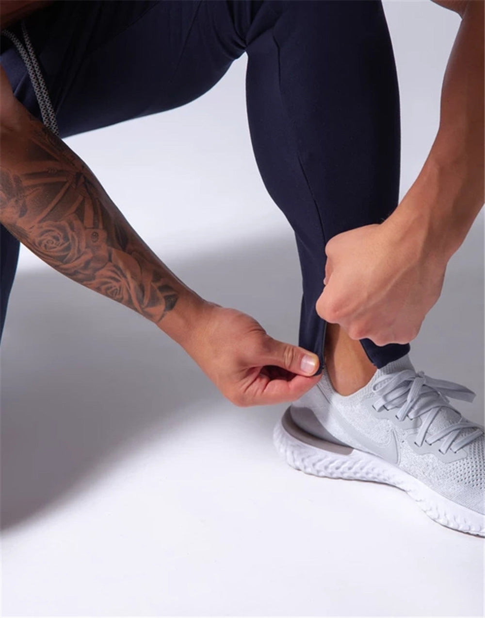 2019 Men's Sports Pants Men's Slim-Fit Elastic Invisible Zipper Casual Pants Stretch Cotton Foot-Retaining Pants Men's